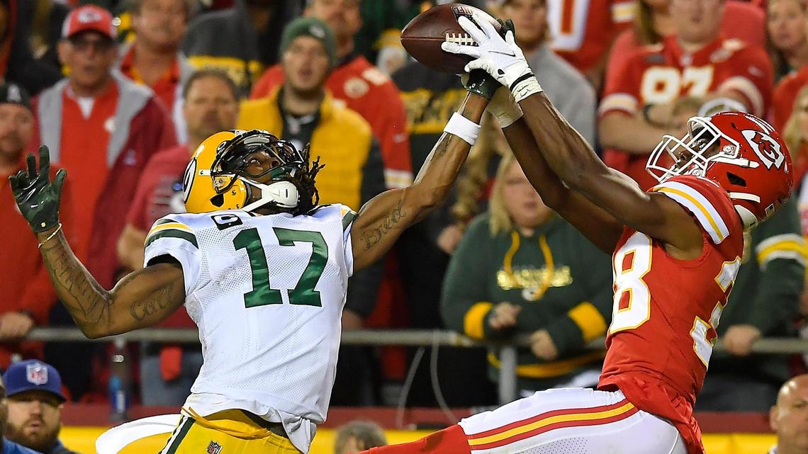The Chiefs defense, including this fourth quarter interception by L’Jarius Sneed, right, stepped up their game in defeating Davante Adams and the Green Bay Packers, 13-7, Sunday Arrowhead Stadium.