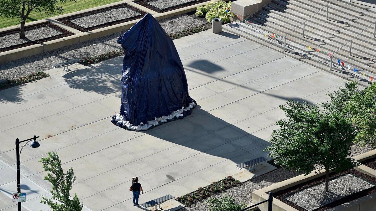 After being vandalized, the statue of Andrew Jackson that sits in front of the Jackson County Courthouse was seen covered up Friday, June 26, 2020.