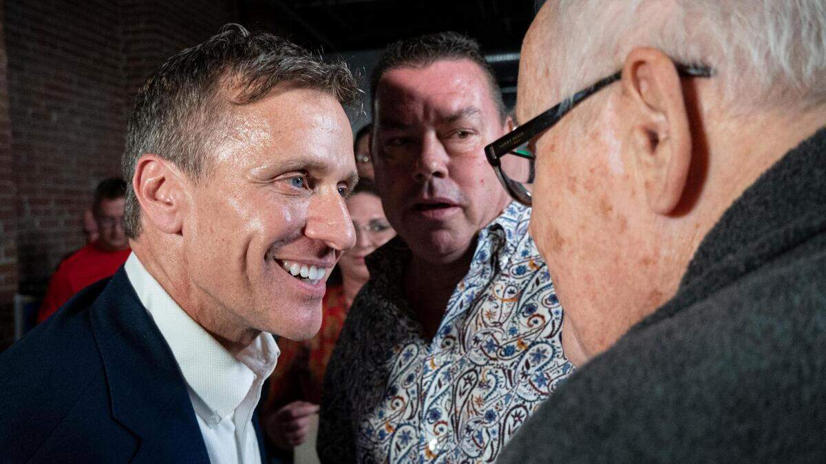 Former Missouri Gov. Eric Greitens speaks with supporters as he makes a campaign stop at The Jewel event space in Kansas City while on a campaign stop Monday in his quest for a seat in the U.S. Senate.