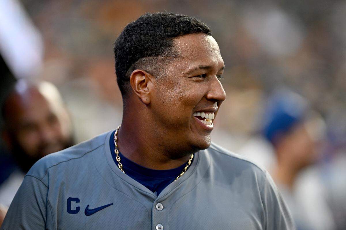 Kansas City Royals first baseman Salvador Perez (13) celebrates in the dugout after the Royals scored six runs against the Detroit Tigers in the seventh inning at Comerica Park on Aug. 2, 2024.