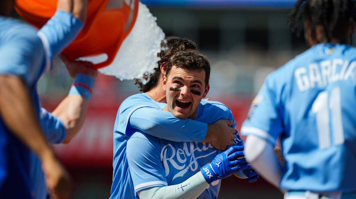 Teammates give Royals second baseman Michael Massey an ice-water bath in celebration of his walkoff single to right field on Sunday afternoon against the Washington Nationals at Kauffman Stadium.
