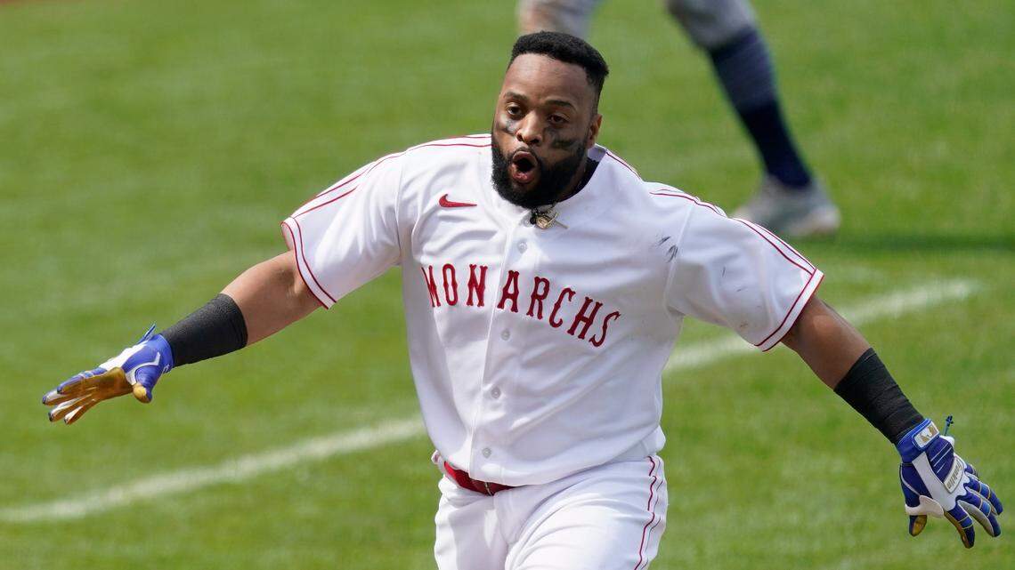Kansas City Royals’ Carlos Santana celebrates after hitting a walk-off home run during the ninth inning of a baseball game against the Detroit Tigers Sunday, May 23, 2021, in Kansas City, Mo. The Royals won 3-2. (AP Photo/Charlie Riedel)