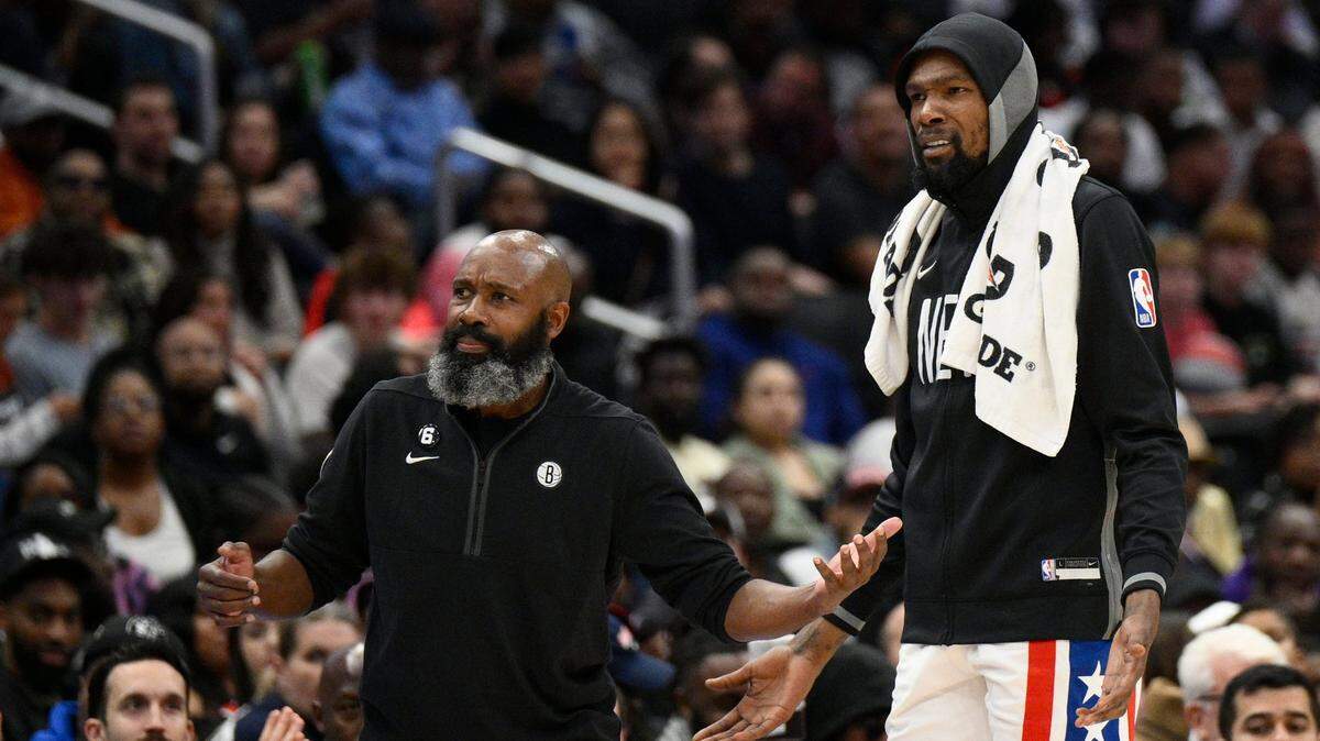 New Brooklyn Nets head coach Jacque Vaughn, left, and forward Kevin Durant, right, during the first half of an NBA game against the Washington Wizards, Friday, Nov. 4, 2022.