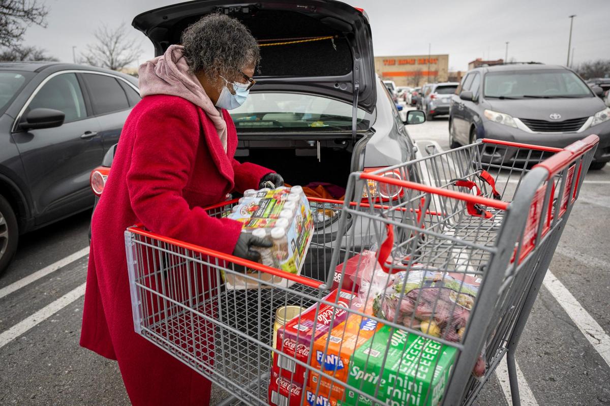 Ahead of the incoming storm, Patricia Taylor of Kansas City loaded essentials into her car after stocking up at Costco on Saturday, Jan. 4, 2025, in midtown Kansas City. The storm is expected to bring heavy snow, rain, ice and wind to the to the area.