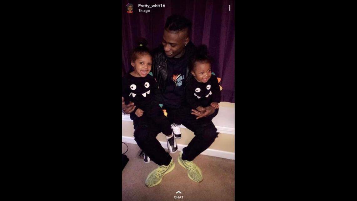 Trenton Washington poses with two of his sons. Earlier this month, Washington, 33, died within a few weeks of arriving at U.S. Penitentiary Leavenworth.
