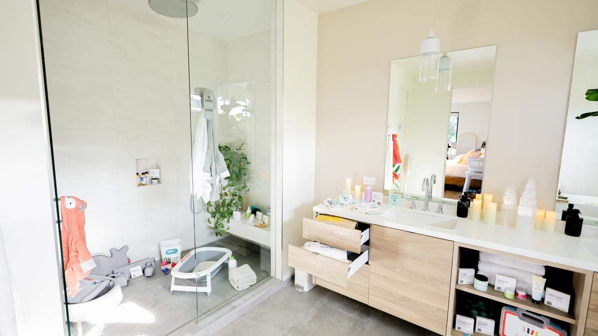 A bathroom cluttered.