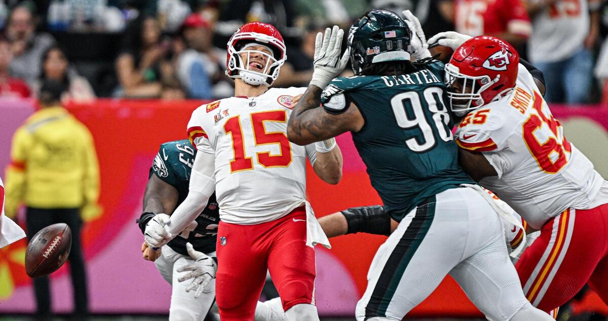Philadelphia Eagles defensive tackle Milton Williams (93) strips the ball from Kansas City Chiefs quarterback Patrick Mahomes (15) in the fourth quarter during Super Bowl LIX on Sunday, Feb. 9, 2025, in New Orleans. The Eagles recovered the ball on the play.