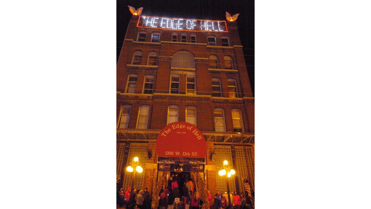 Customers wait in lines to enter The Edge of Hell Friday night, Oct. 16, 2015, in Kansas City’s West Bottoms.