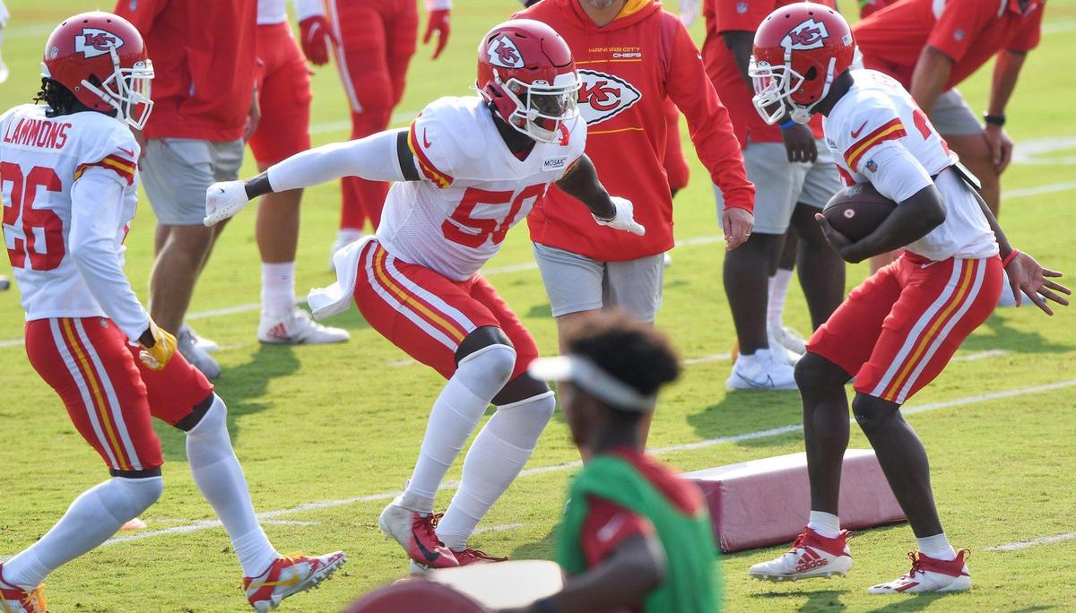 Kansas City Chiefs linebacker Willie Gay (50) does a drill with cornerbacks DeAndre Baker (30) and Chris Lammons during the Kansas City Chiefs training camp at Missouri Western State University in St. Joseph Tuesday, Aug. 3, 2021.