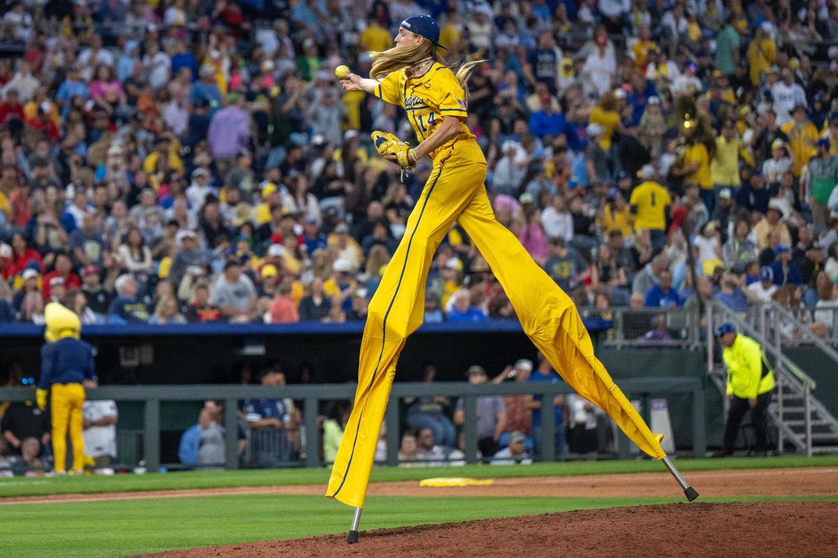 Savannah Bananas pitcher Kyle Luigs (14) throws a pitch in the seventh inning during a Banana Ball game against the Firefighters at Kauffman Stadium on Friday, May 23, 2025, in Kansas City.