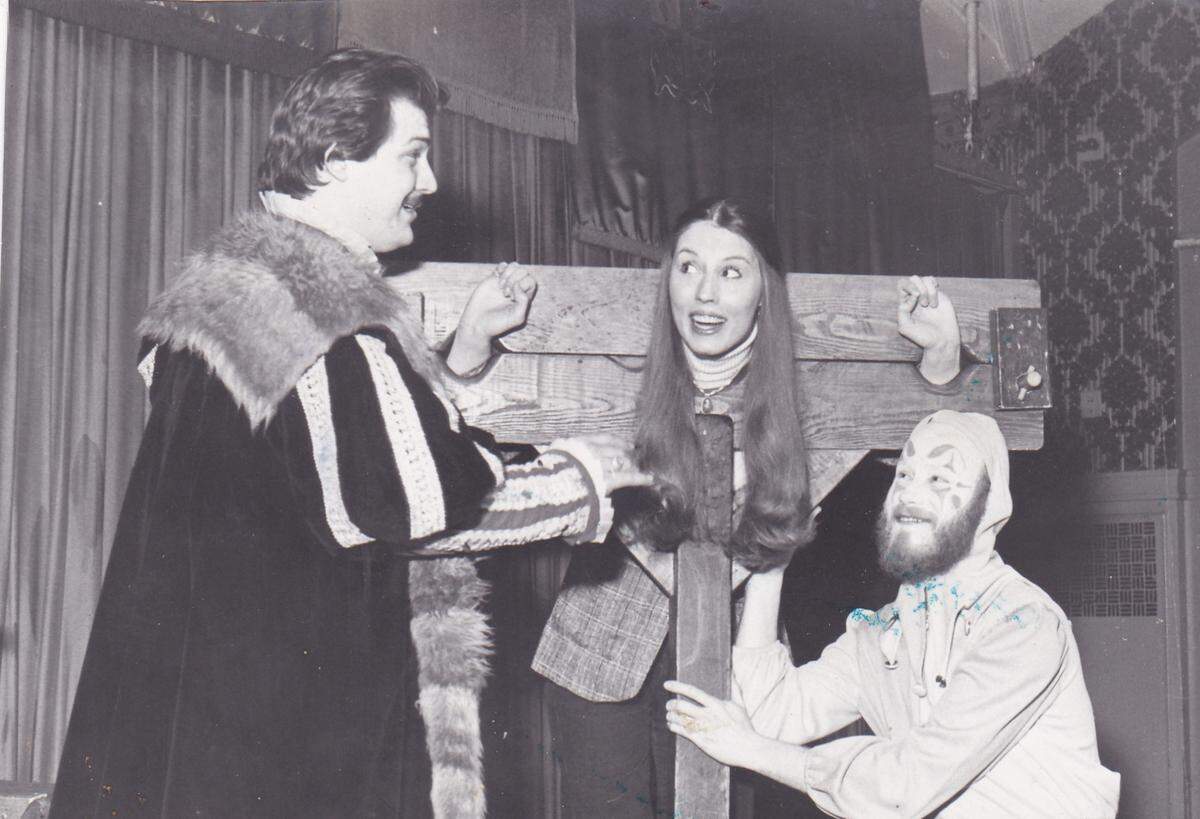 John Woolam, left, Katey McGuckin, center and Michael Leonard, right, act in King Henry’s Feast. N.d.