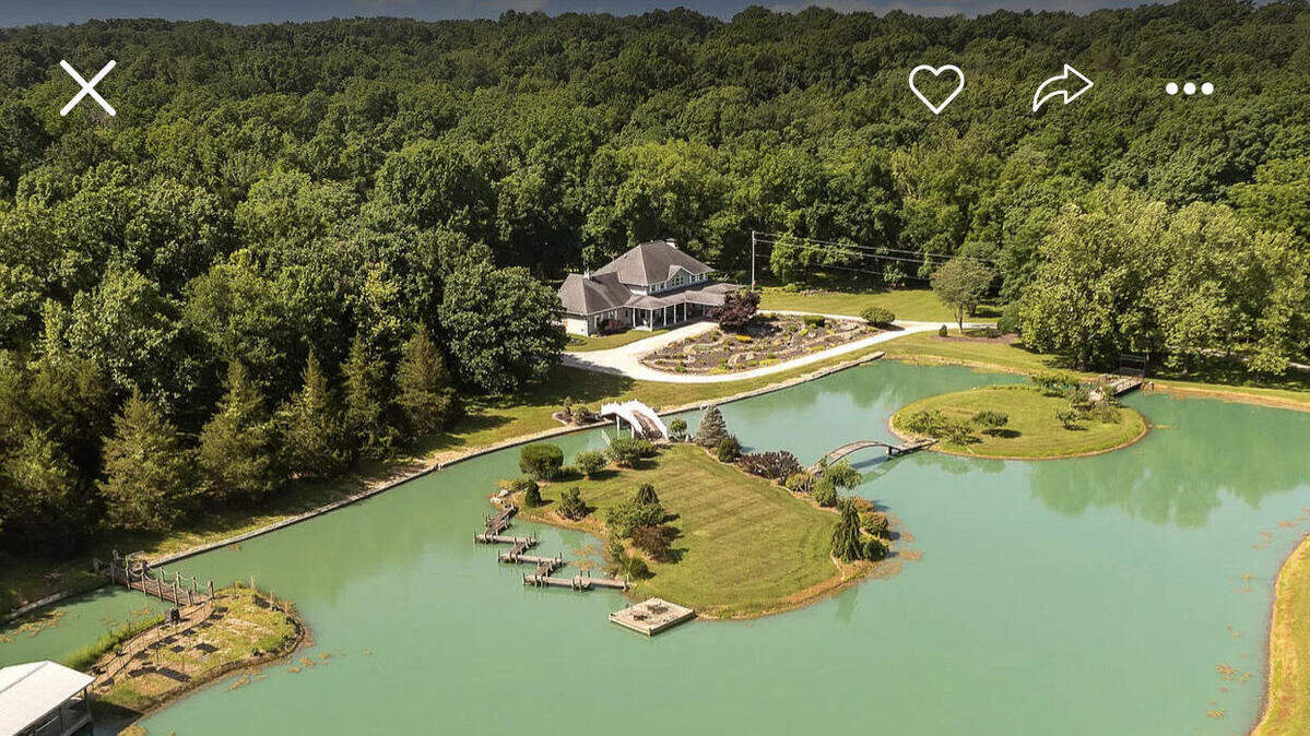 This estate listed for $1,875,000 in Columbia, Missouri, includes a “fully stocked” lake.