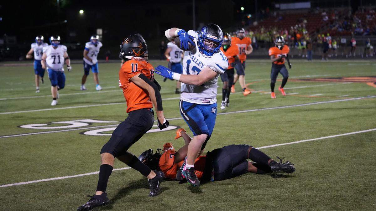 Grain Valley’s Ty Williams breaks through the Platte County defense en route to one of his six touchdowns during Friday’s 45-24 win.