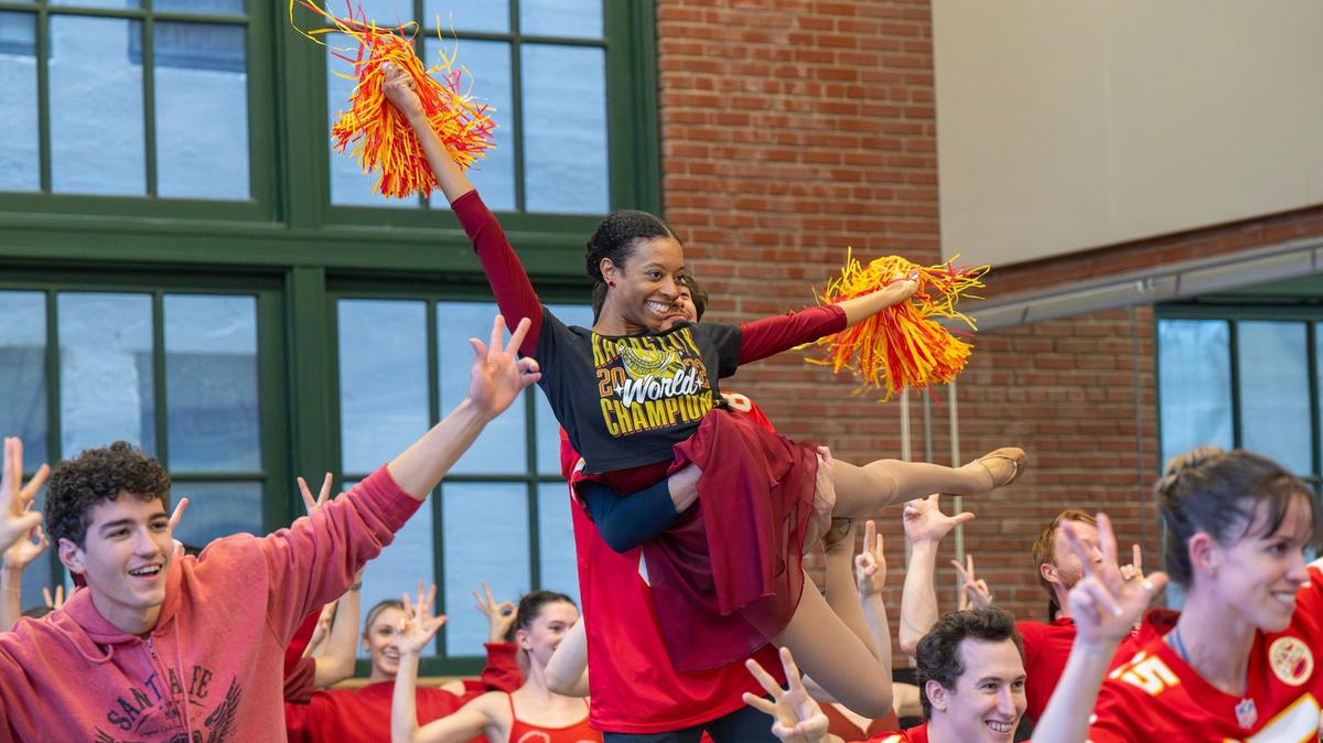 Kansas City Ballet dancers perform in Chiefs attire during a rehearsal at the Todd Bolender Center for Dance & Creativity on Thursday, Jan. 30, 2025, in Kansas City. The dancers filmed a video challenging the Philadelphia Ballet to a dance-off ahead of Super Bowl LIX.