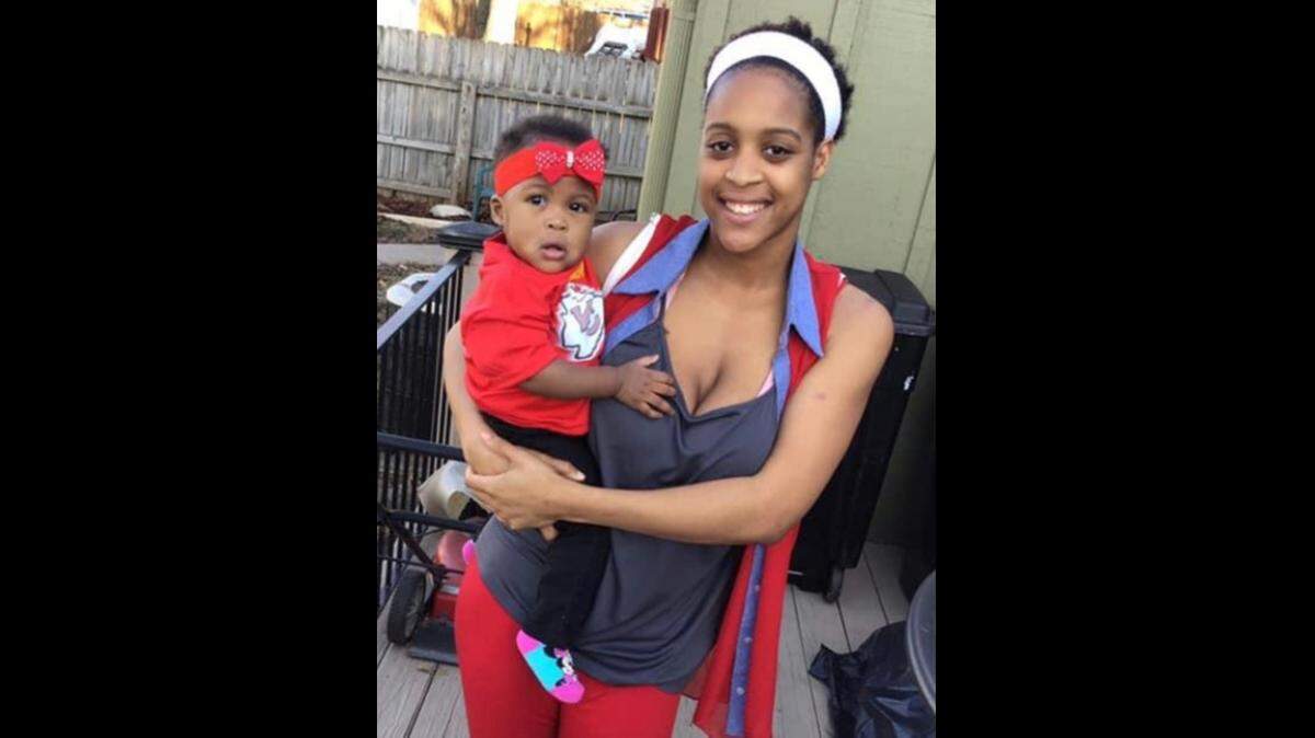 Diamon Eichelburger, pictured with her 1-year-old daughter, Belle, was shot and killed outside a Kansas City 7-Eleven in July 2020. Her killing was among a record number of homicides in the city in 2020.