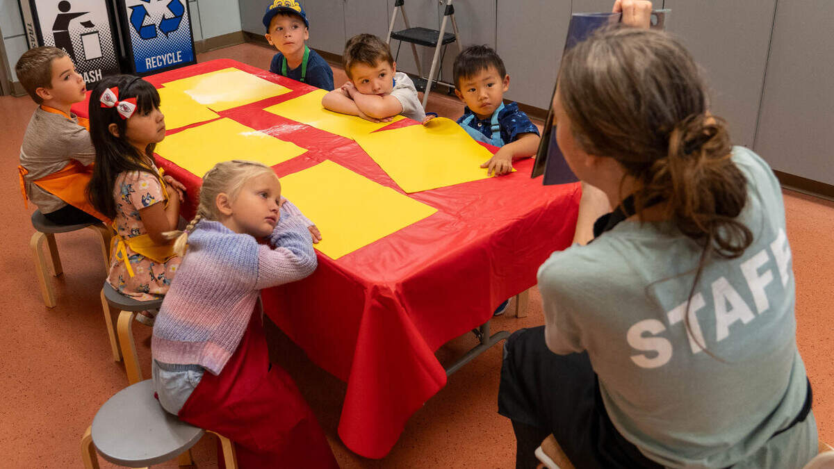 Six Book Cooks sat attentively listening to a reading of “Ninja Red Riding Hood” while the blueberry scones they made were baking. The Book Cooks program is part of Olathe Parks & Recreation.