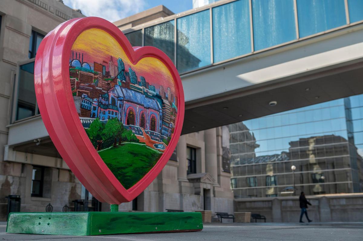 A heart called “Home” created by artist Tracy Kapperman is displayed in front of Union Station on Monday, March 7, 2022. The heart artworks, 154 of them, were made by 123 local artists and will be installed throughout the metro in the coming days.