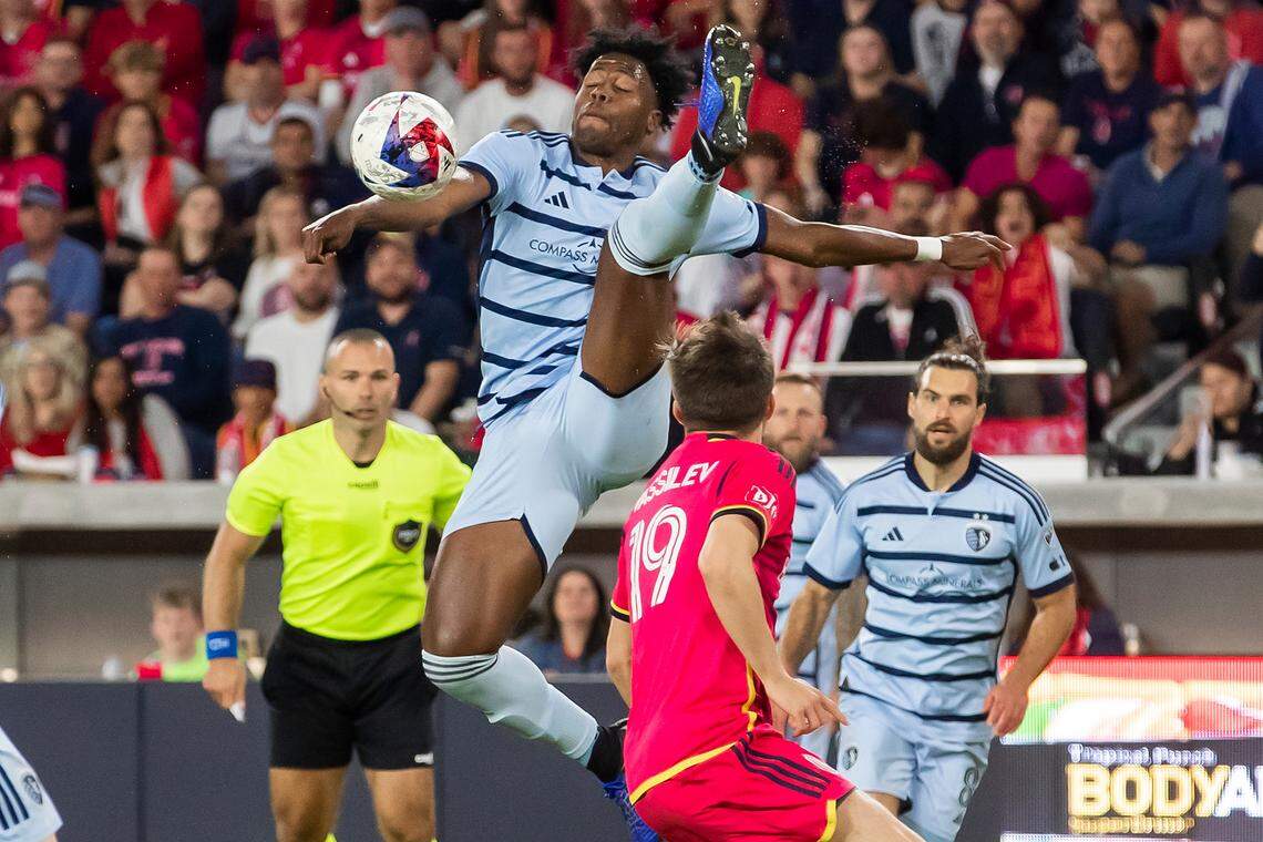 Sporting Kansas City defender Dany Rosero goes high in an attempt to gain control of the ball during Saturday night’s inaugural match between Sporting Kansas City and St. Louis City SC at CITYPARK in St. Louis. 