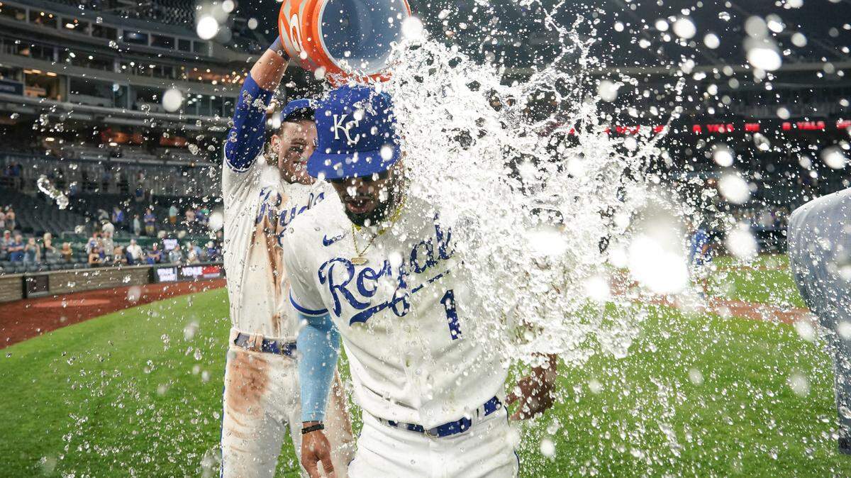 Kansas City Royals right fielder MJ Melendez (1) is doused by shortstop Bobby Witt Jr. (7) after the win over the Chicago White Sox at Kauffman Stadium on May 8, 2023.