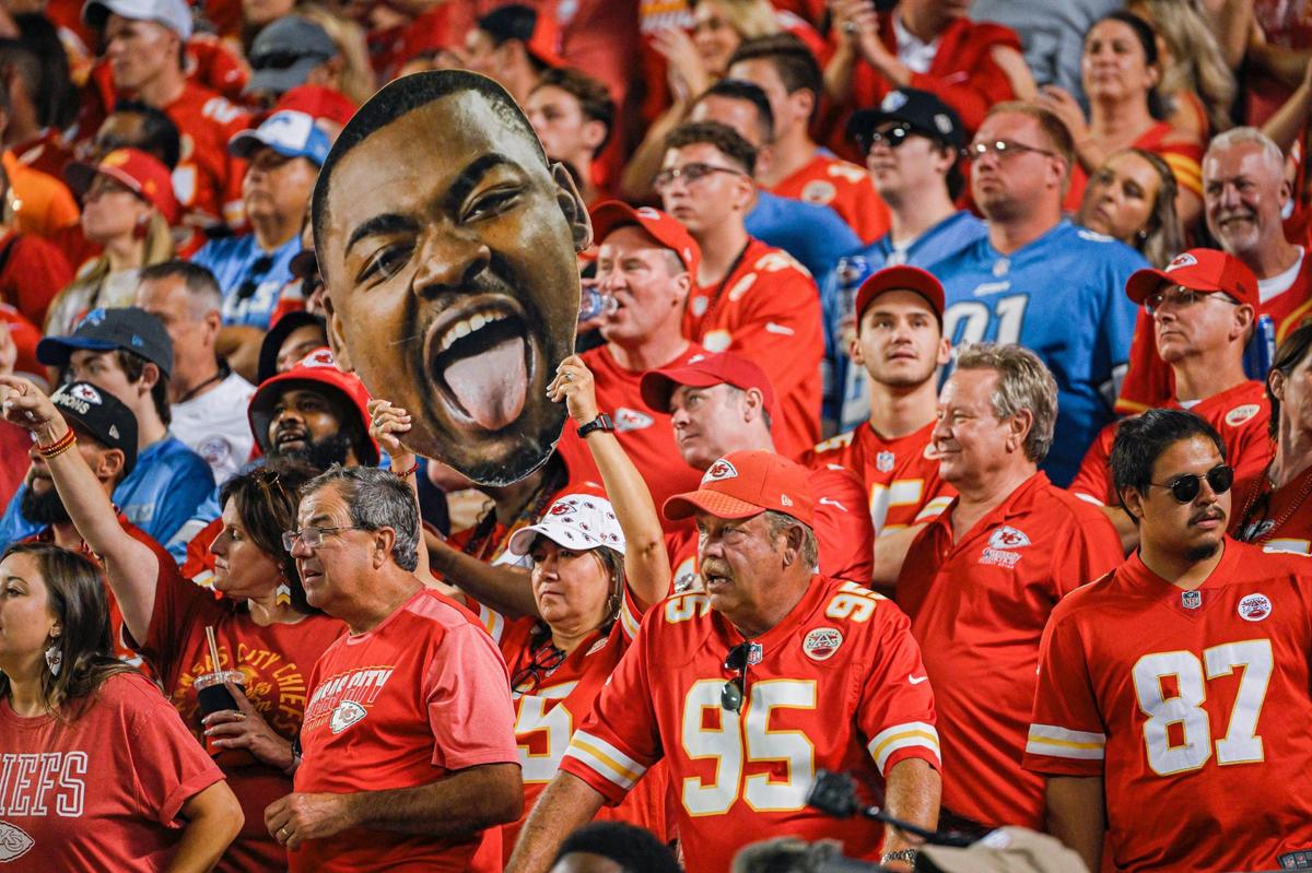 A Kansas City Chiefs fan holds up a cutout of defensive tackle Chris Jones’ face as the Chiefs lose 21-20 to the Detroit Lions in an NFL football game on Thursday, Sept. 7, 2023, in Kansas City.