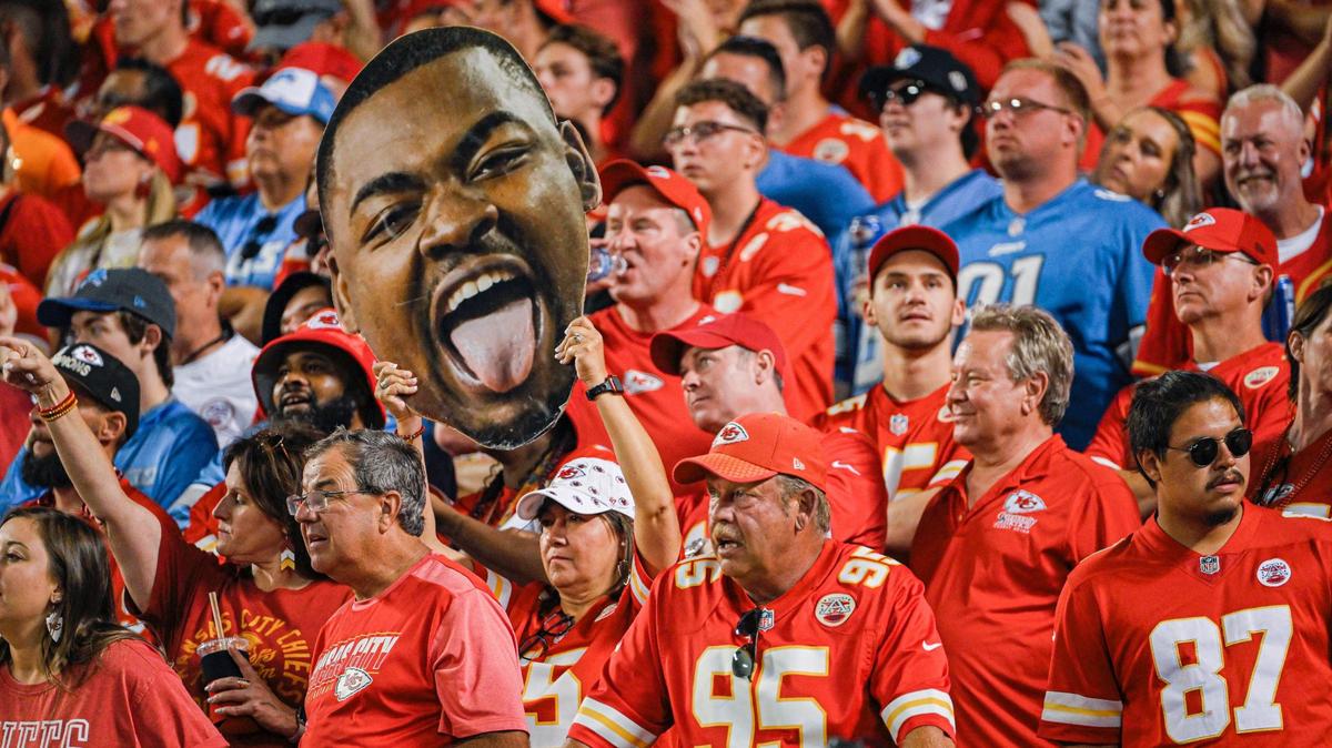 A fan holds up a cutout of defensive tackle Chris Jones’ face during the Chiefs’ 21-20 loss to the Detroit Lions last Thursday at GEHA Field at Arrowhead Stadium.