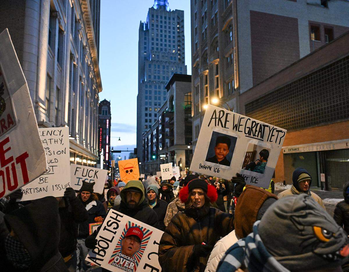 Protesters joined nationwide demonstrations against ICE in downtown Kansas City in freezing temperatures on Friday, Jan. 30, 2026.