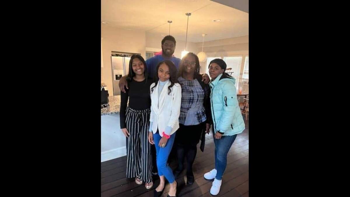 Xavier Townsend-Keith poses with family. On May 28, he was fatally shot after walking his girlfriend of two years to the bus stop near 51st Street and Prospect Avenue.