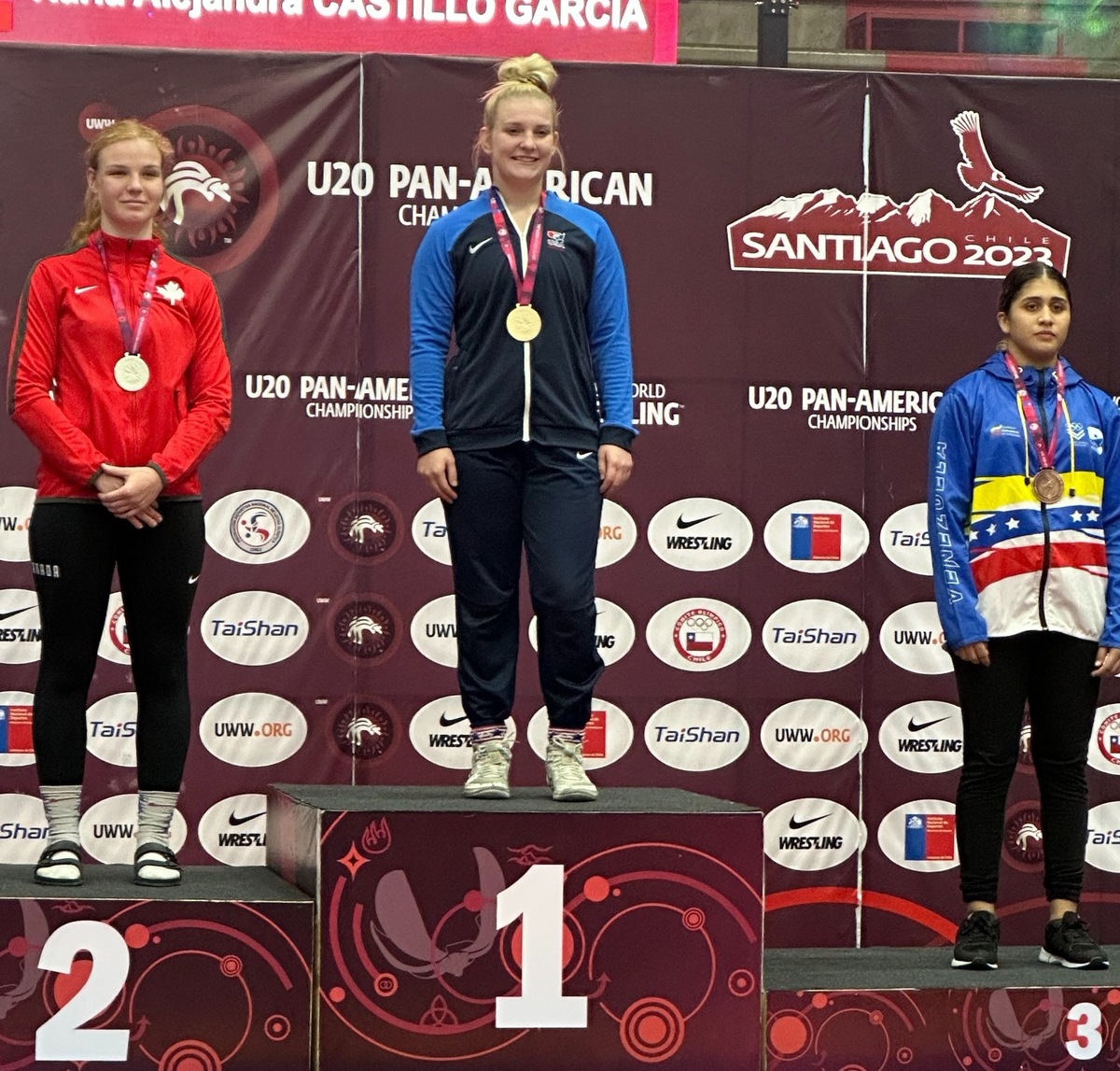 Fort Osage High grad Haley Ward, center, won the 72-kilogram gold medal at Pan-American Championships in Chile.