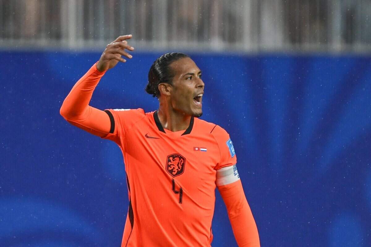 Netherlands defender Virgil van Dijk (4) yells over the roar of the crowd at the Netherlands vs. Tunisia FIFA World Cup group-stage soccer match at Kansas City (Arrowhead) Stadium in Kansas City on Thursday, June 25, 2026.