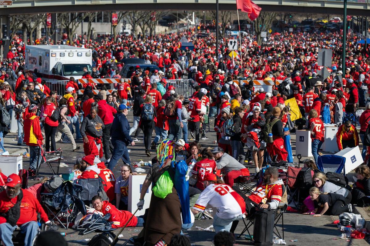People in take cover or run away after hearing gunshots after the Kansas City Chiefs Super Bowl LVIII championship rally on Wednesday, Feb. 14, 2024, at Union Station in Kansas City.