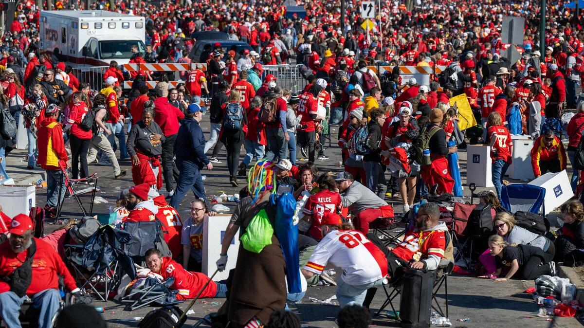 People take cover or run away after hearing gunshots after the Kansas City Chiefs’ Super Bowl LVIII championship rally on Wednesday, Feb. 14, 2024, at Union Station in Kansas City.