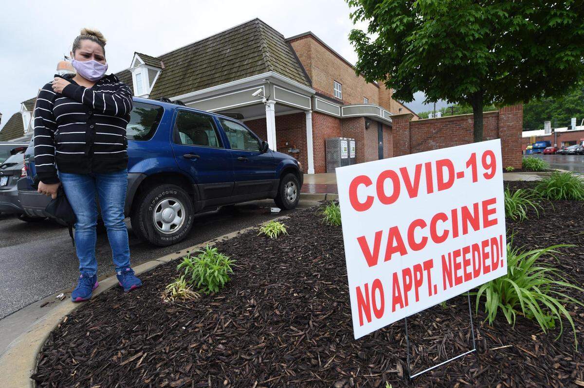 “I want to protect my family,” said Angela Lagunes of Overland Park, who chooses to wear a mask to protect herself against the coronavirus. Lagunes, a mother of three, has yet to be vaccinated. “I’ll probably get vaccinated sometime soon,” said Lagunes, who said she fears having a reaction to the vaccine and having to miss work at The French Market in Prairie Village. COVID-19 vaccinations are being offered, no appointment necessary, at the Hen House Market in Prairie Village.