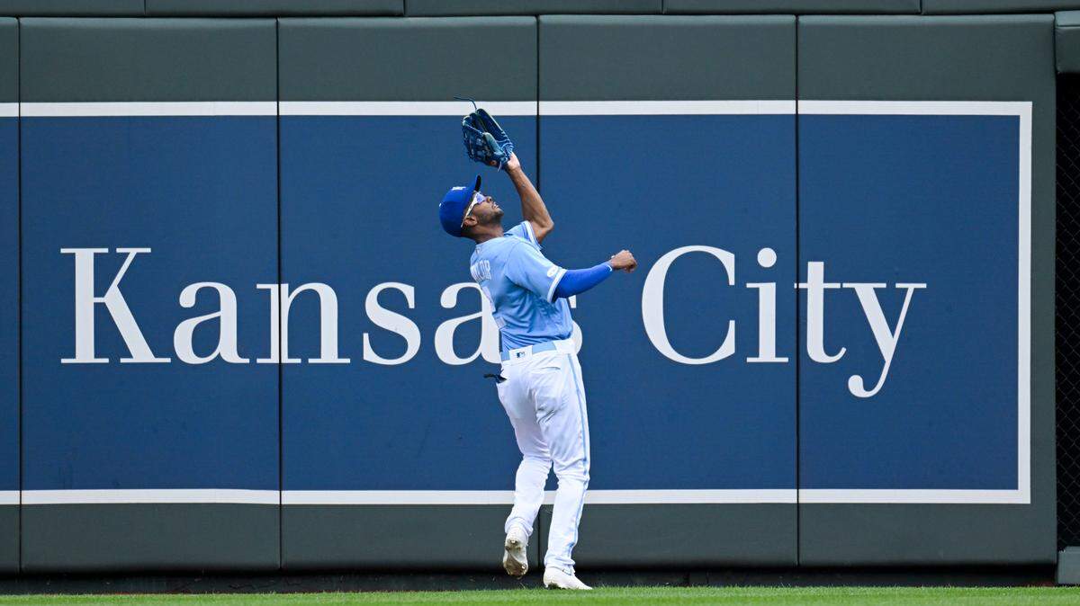 Kansas City Royals center fielder Michael A. Taylor catches this fly off the bat of the Houston Astros’ Yordan Alvarez during the first inning of a baseball game, Sunday, June 5, 2022, in Kansas City, Mo. (AP Photo/Reed Hoffmann)