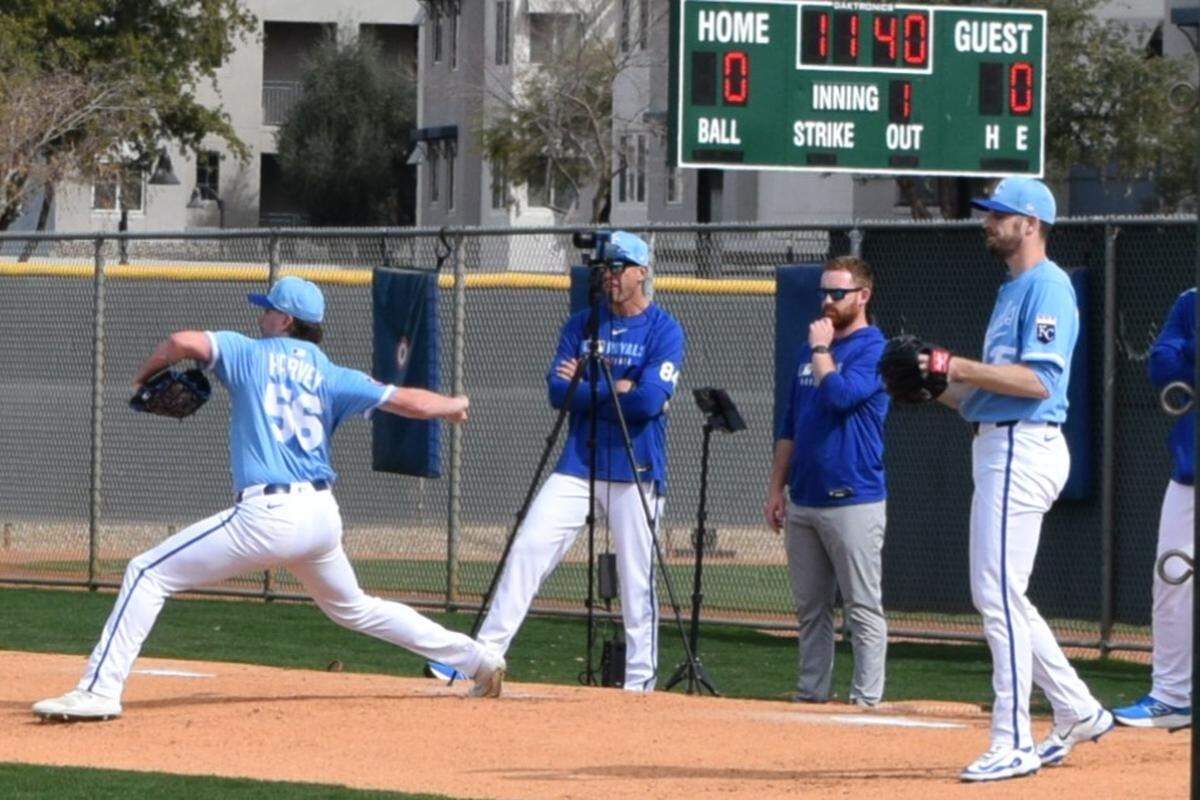 Kansas City Royals reliever Hunter Harvey (left) throws a pitch during Sunday’s bullpen session on Feb. 16 at the club’s spring training facility in Surprise, Arizona.