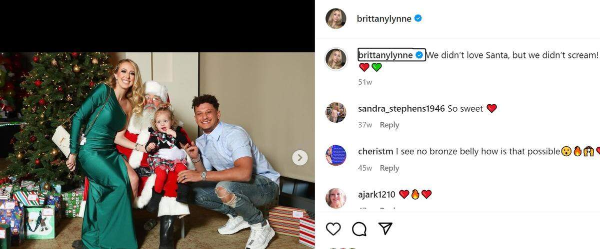 Brittany, Sterling and Patrick Mahomes with Santa Claus in December 2022.