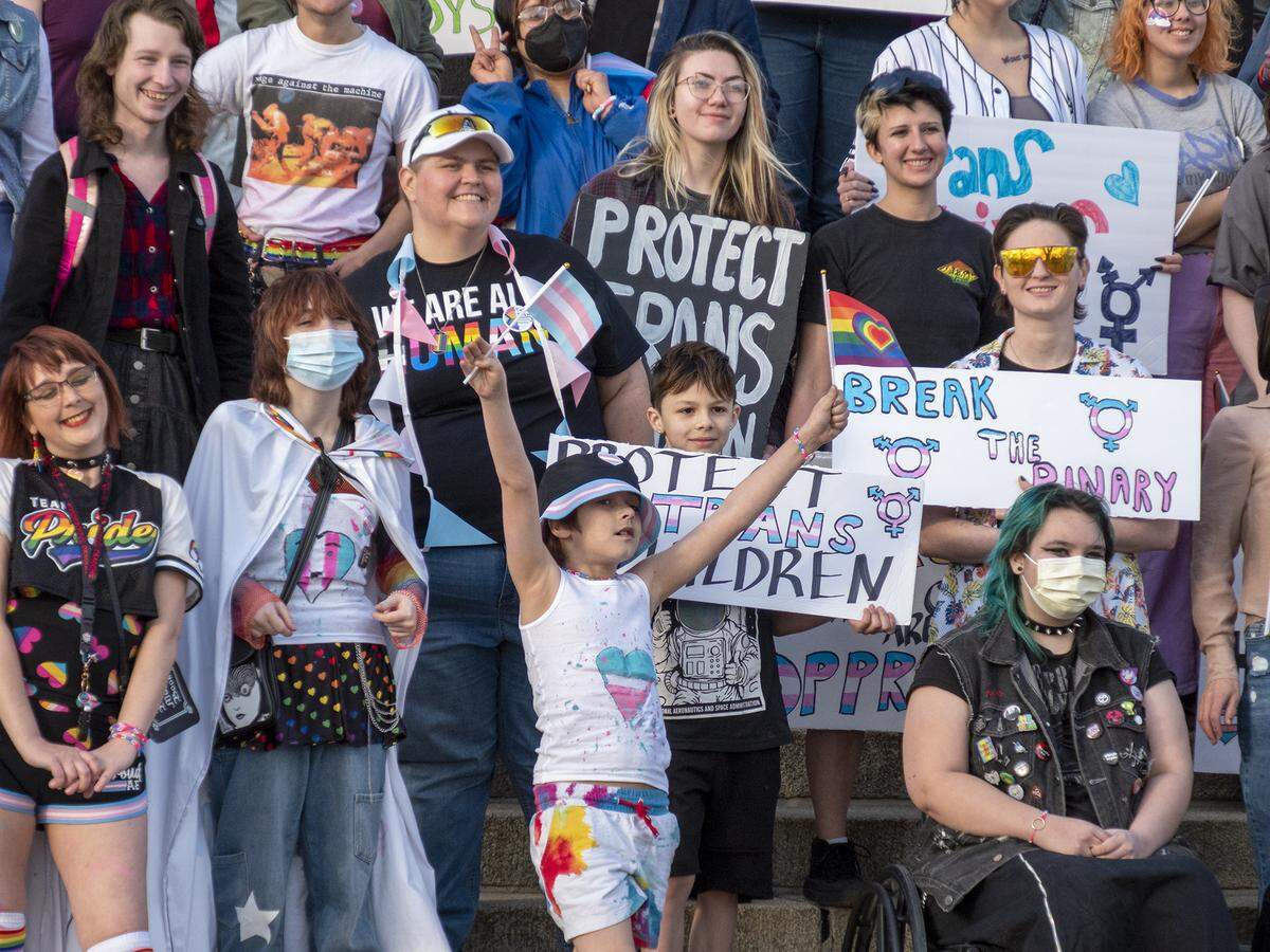 Kansans rally in support of trans rights outside the Kansas statehouse on March 31.