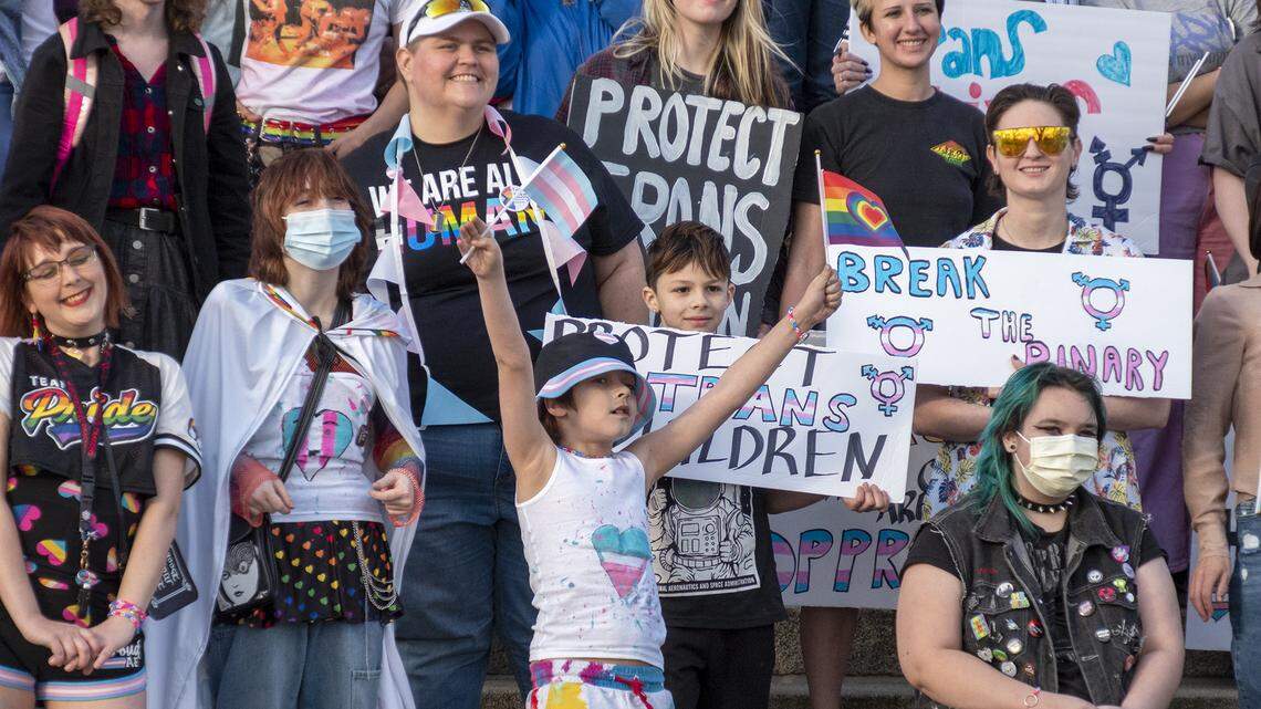 Kansans rally in support of trans rights outside the Kansas statehouse on March 31.