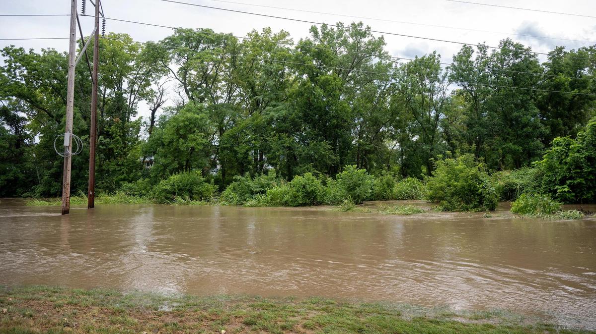 Days after the KCFD rescued a woman from this area near 103rd Street and Wornall Road during a flash flood on Indian Creek on Monday, July 21, 2025, in Kansas City, an unidentified person drowned in the stream, near 103rd Street and State Line. 
