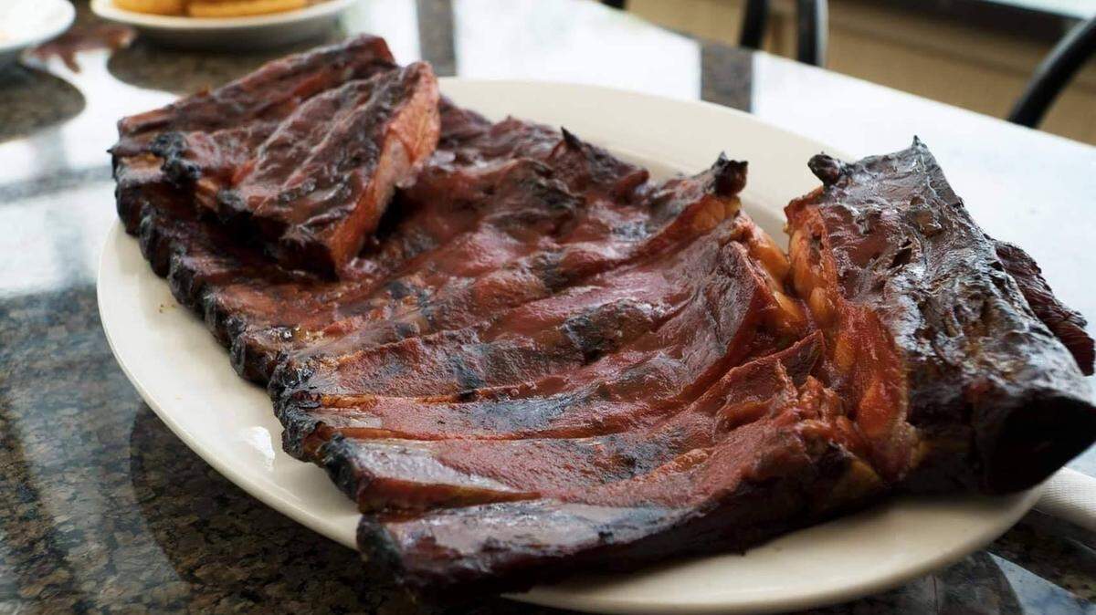 Ribs are sold ab Big Q Barbecue.