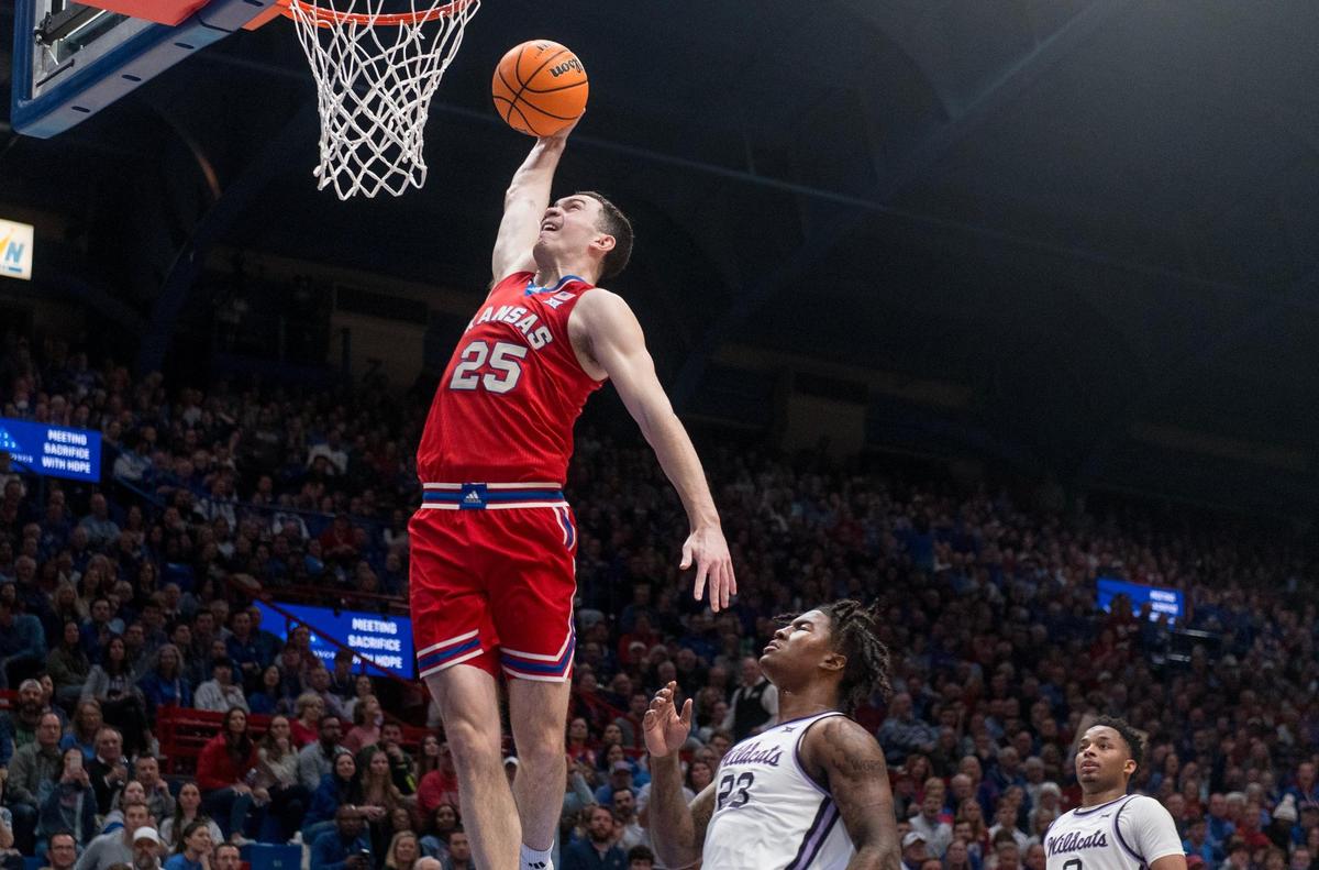 Kansas Jayhawks guard Nicolas Timberlake (25) dunks the ball against the Kansas State Wildcats during an NCAA college basketball game on Tuesday, March 5, 2024, in Lawrence.