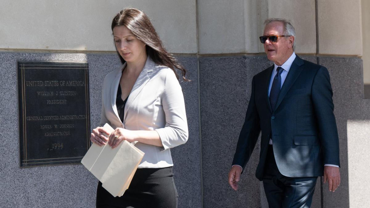 Former Boilermakers International President Newton Jones and his wife, Kateryna Jones, prepare to enter the Robert J. Dole Federal Courthouse in Kansas City, Kansas, on Sept. 3, 2024, for their initial court appearance after being indicted in an alleged $20 million union embezzlement scheme.