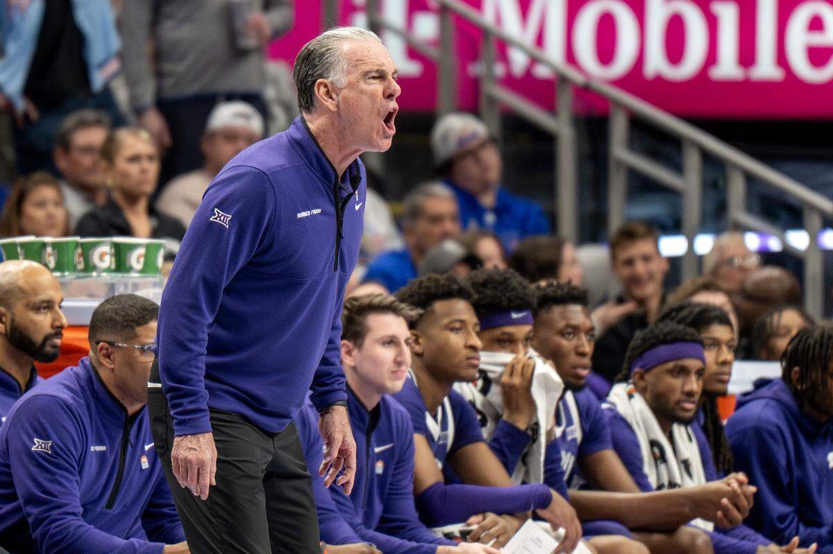 Texas Christian University Horned Frogs head coach Jamie Dixon yells during the second half of a Big 12 Men's Basketball Tournament game against the Kansas Jayhawks at T-Mobile Center on Thursday, March 12, 2026, in Kansas City.