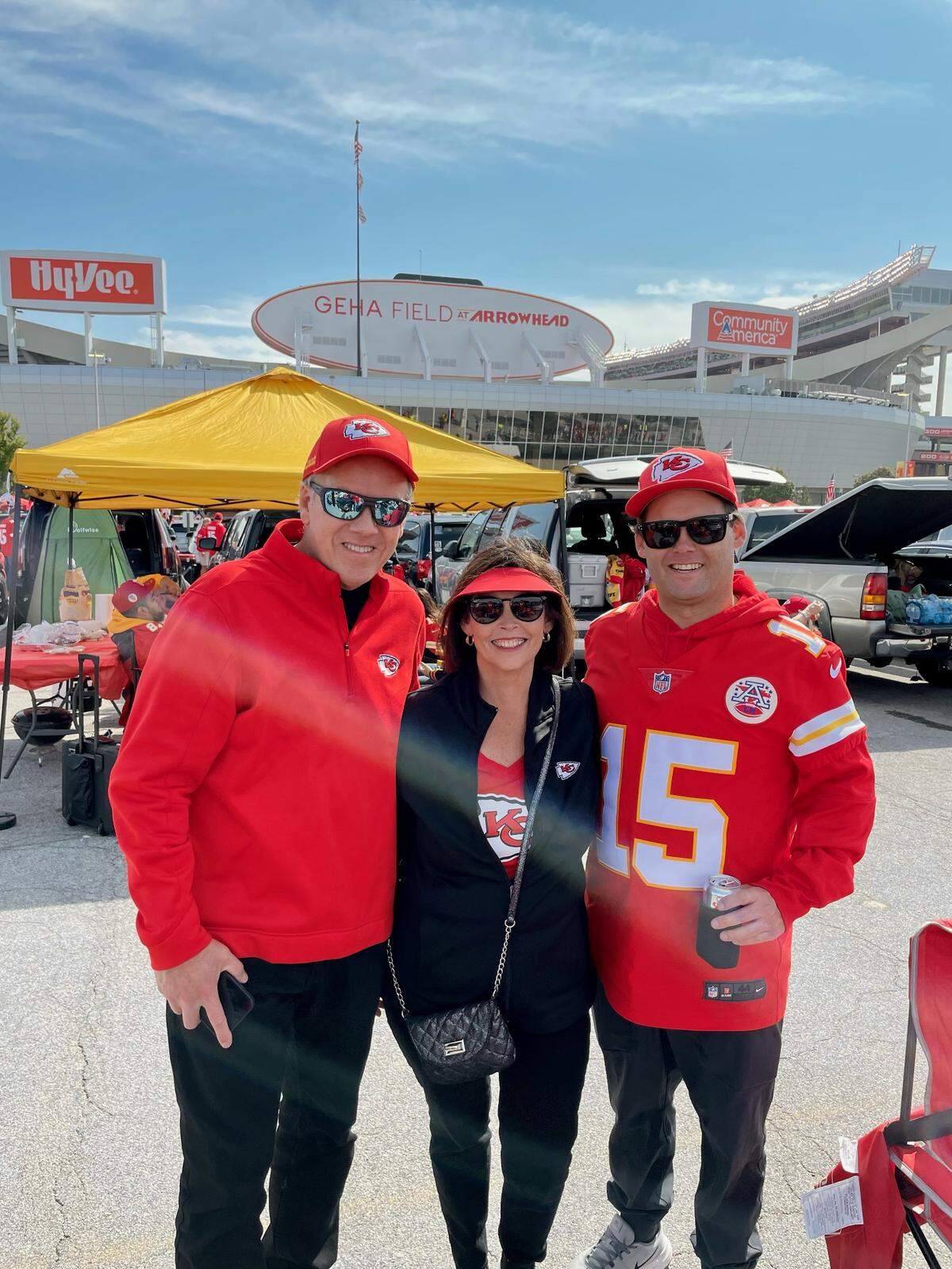 Brad Boan, right, grew up attending Kansas City Chiefs games with his dad, Kelly, and mom, Joy.