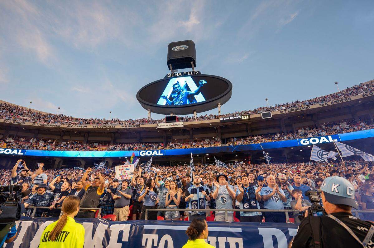 Fans cheer during an MLS game between Sporting Kansas City and Inter Miami at GEHA Field at Arrowhead Stadium on Saturday, April 13, 2024, in Kansas City.