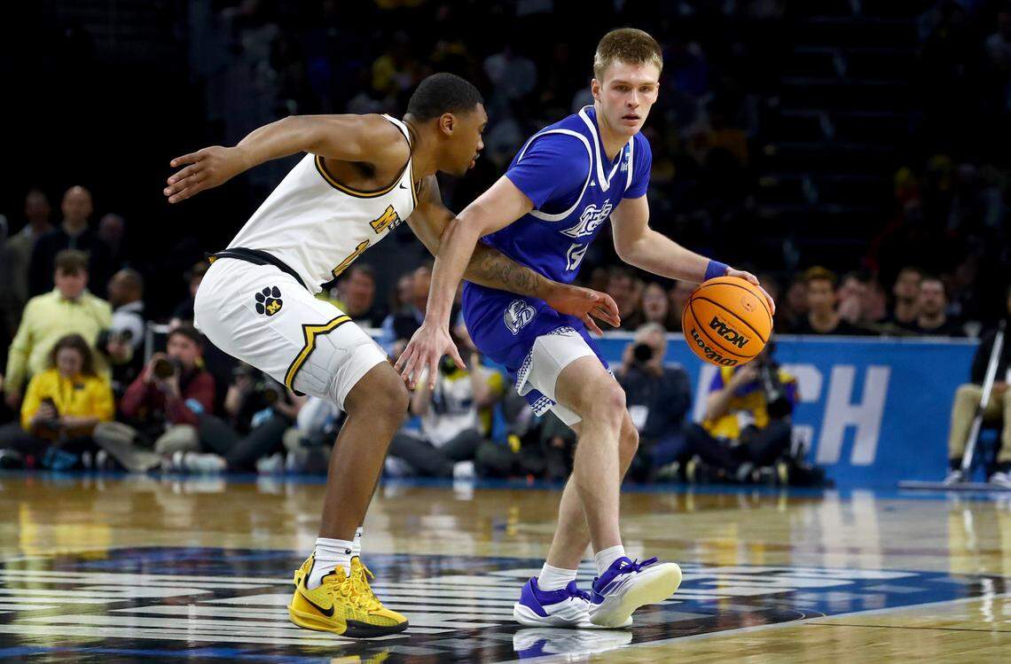 Drake Bulldogs guard Bennett Stirtz (14) dribbles against Missouri Tigers guard Tony Perkins (12) in the first half of a first round men’s NCAA Tournament game at Intrust Bank Arena on March 20, 2025.