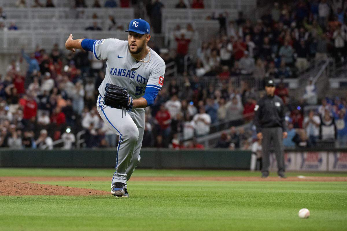 Kansas City Royals closer Carlos Estévez runs to the ball in the ninth inning of a game against the Atlanta Braves at Truist Park on March 28, 2026 in Atlanta, Georgia.