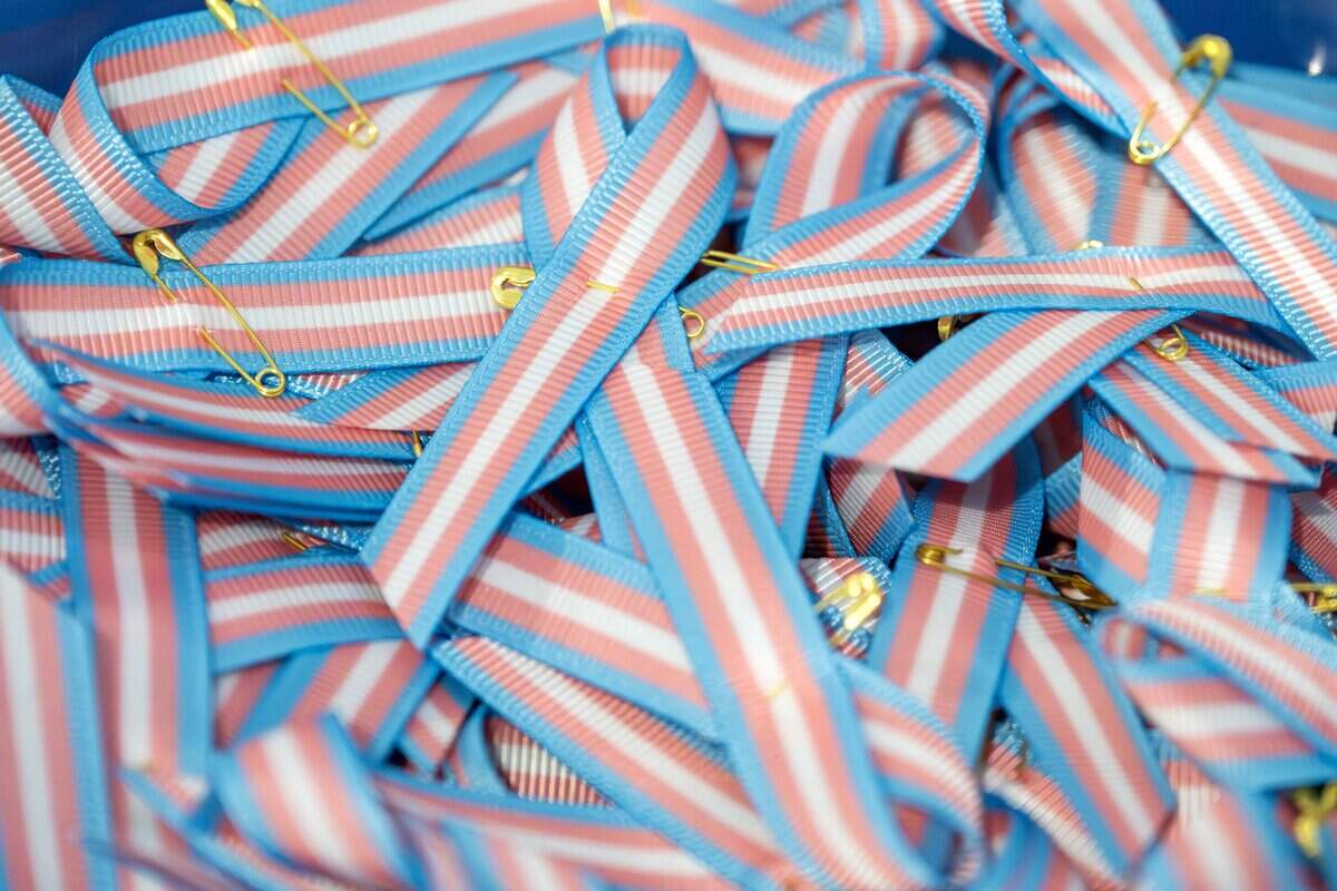Transgender pride ribbons sit on a table during a Trans Day of Remembrance event at Spirit of Hope MCC on Tuesday, March 31, 2026, in Kansas City.