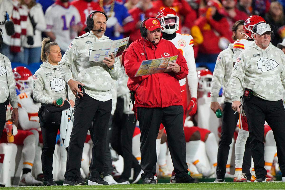 Kansas City Chiefs head coach Andy Reid looks at his play card during the first half against the Buffalo Bills at Highmark Stadium.