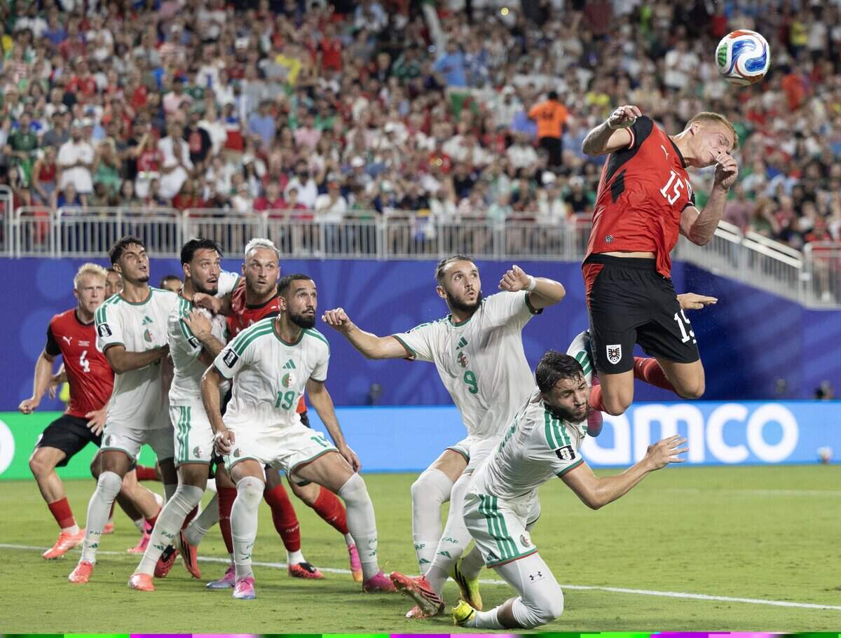 Austria defender Philipp Lienhart (15) just misses a header during a corner kick against Algeria during a FIFA World Cup group-stage soccer match at Kansas City (Arrowhead) Stadium in Kansas City on Saturday, June 27, 2026.
