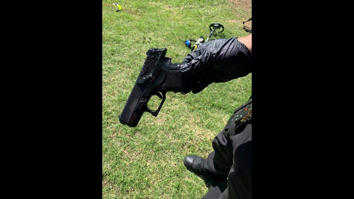 The stolen gun was recovered in a pond, Tulsa police said.